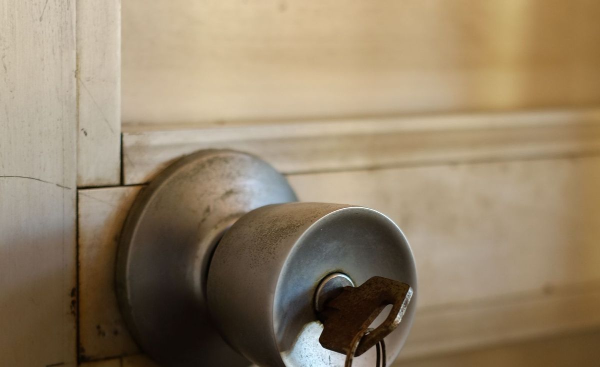 A key turned in a door knob